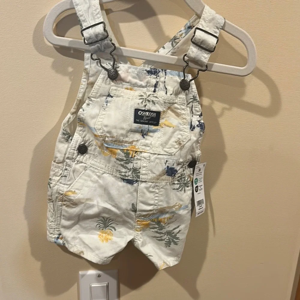 OshKosh B'gosh White and Blue Overalls Distressed Design